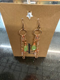 Earrings: Pale green and pale pink glass beads, hand made copper findings. E12