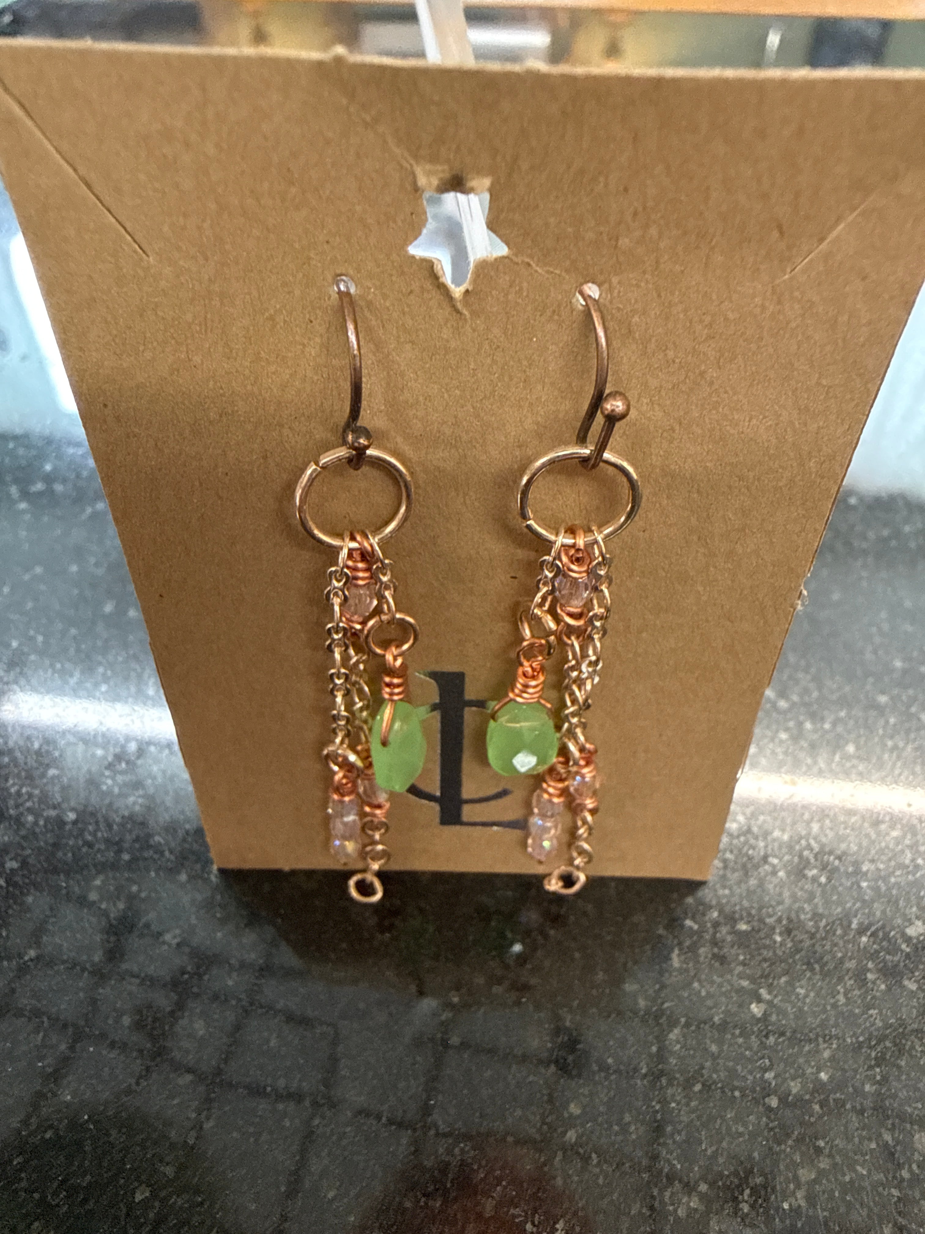 Earrings: Pale green and pale pink glass beads, hand made copper findings. E12