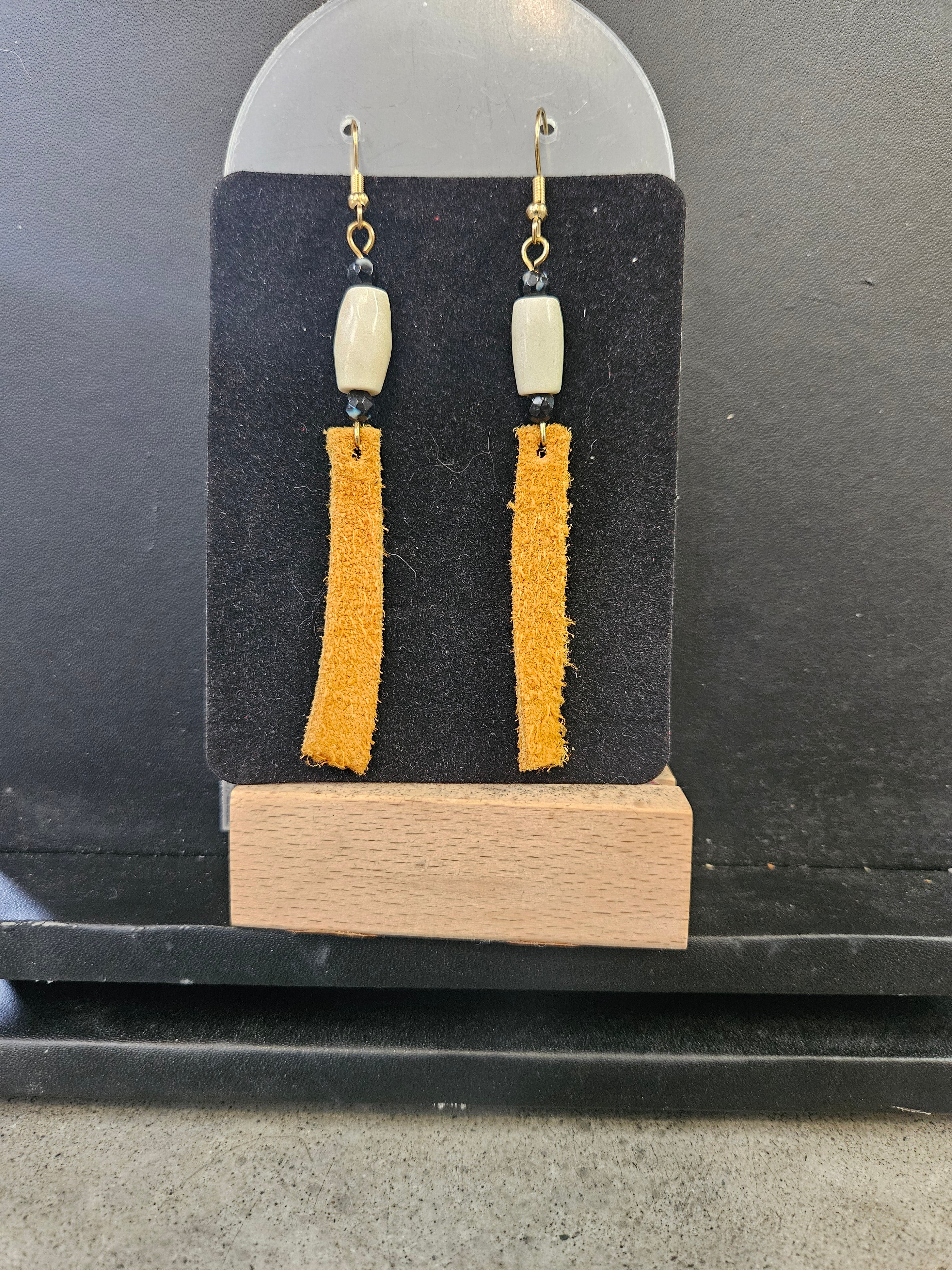 Leather, dentalium and quill earrings
