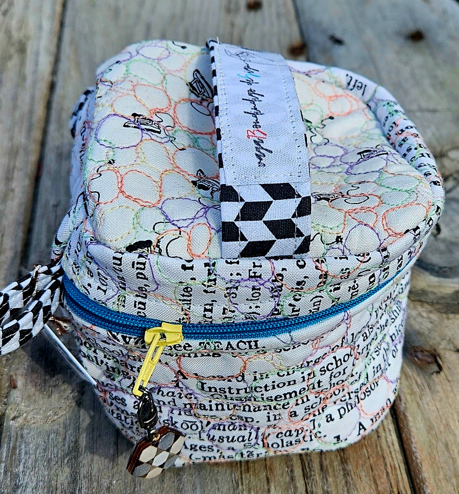 Large quilted zip pouch with zip pull