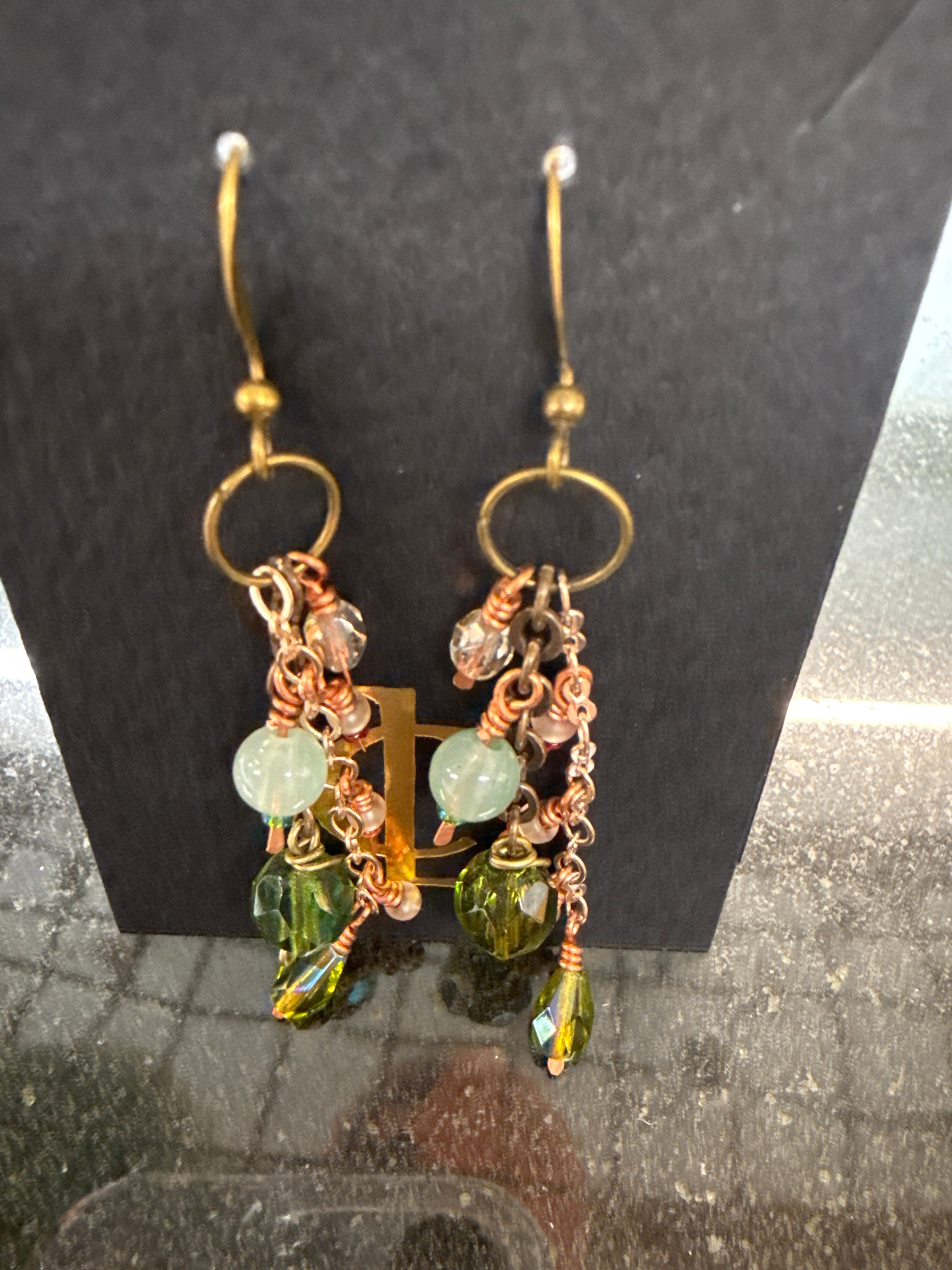 Earrings: Pale green agate, with olive green Czech glass beefs, handmade copper findings.  E28