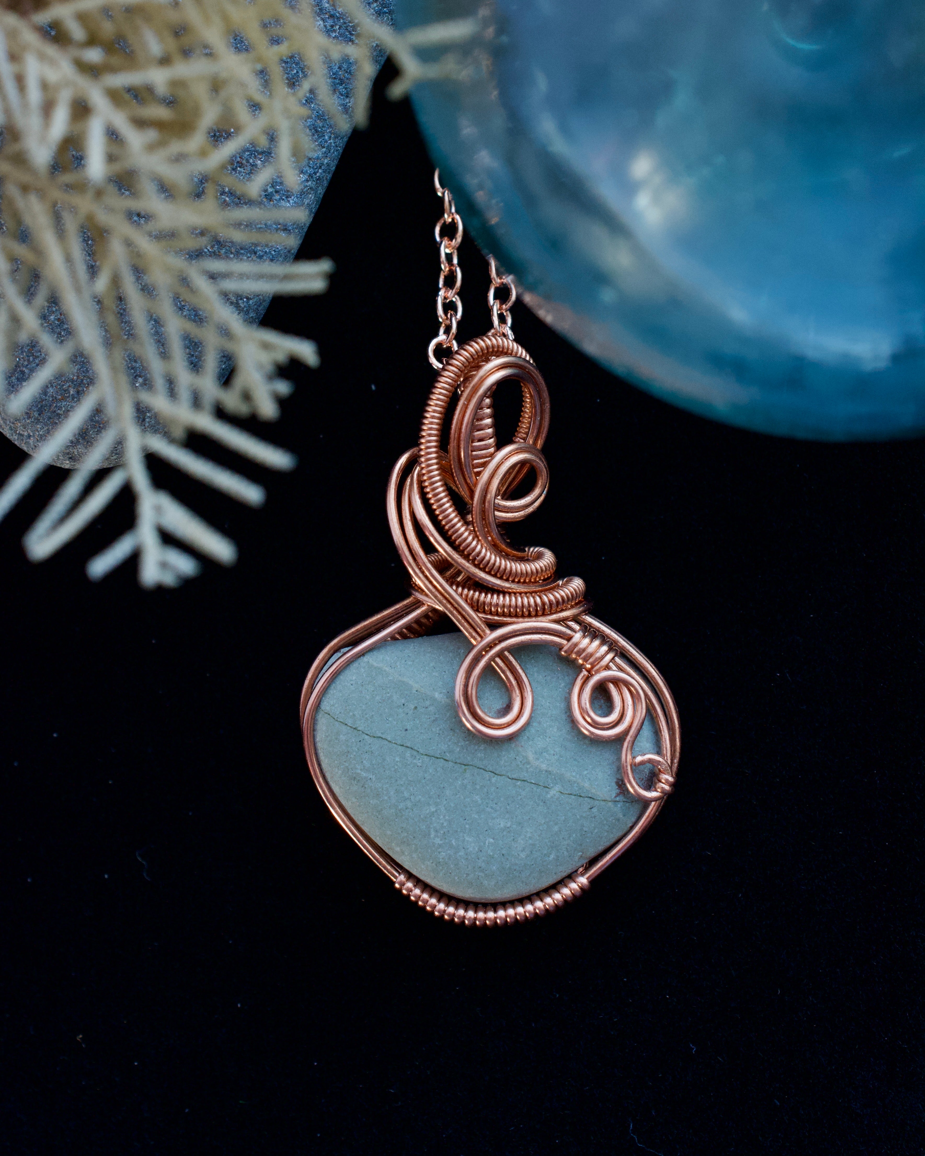 (#297 ws) Necklace: glass beach (Unalaska) stone, copper wrapped, 20 in chain with clasp