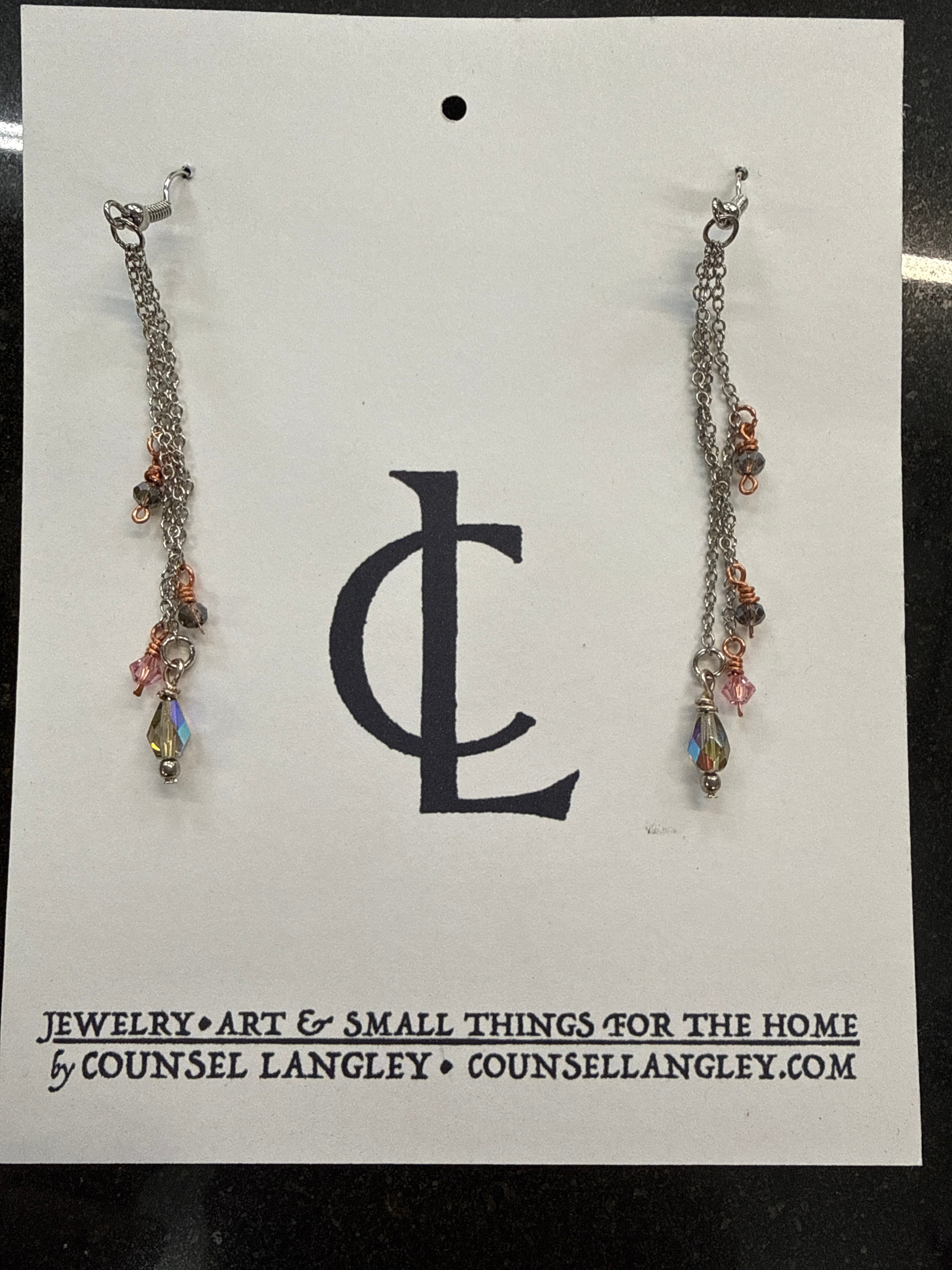 Earrings: Delicate steel chain with copper wires glass beads. E17