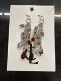 Earrings: Red, white grey, opalescent glass beads on steel chain.  E9