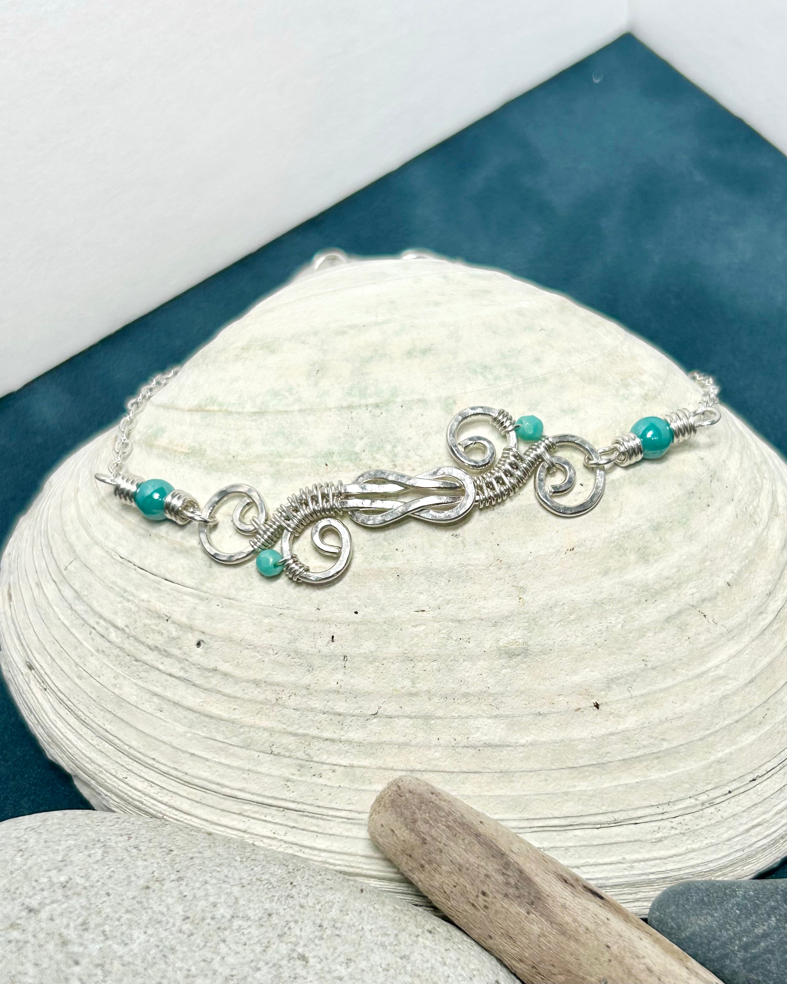 #1029 907 lmm Silver Swirly Square Knot Bracelet, aqua beds, lob clasp