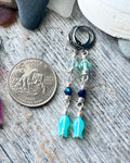 #1232 907 lmm Aqua fish and Swarovski on stainless huggie hoops