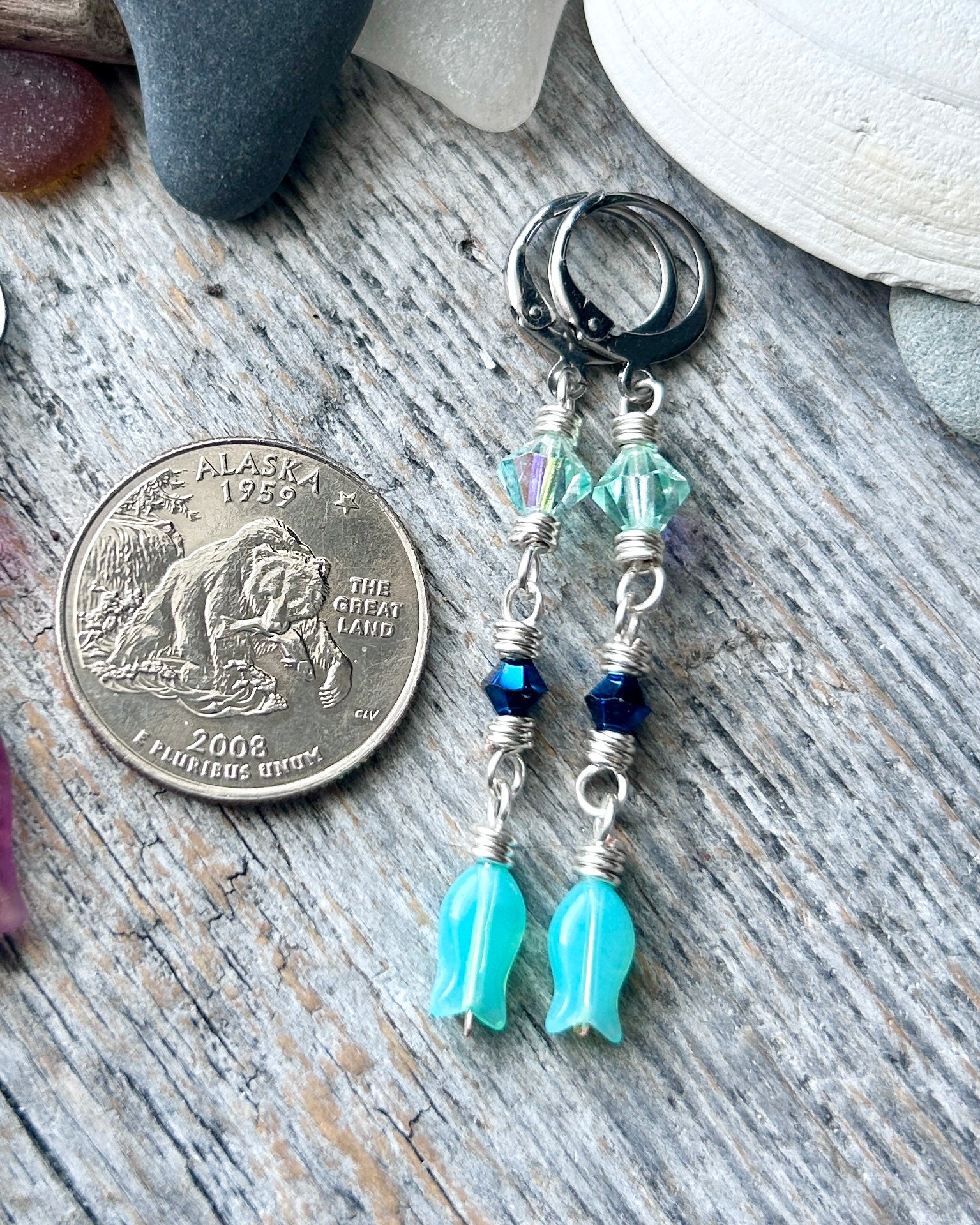 #1232 907 lmm Aqua fish and Swarovski on stainless huggie hoops