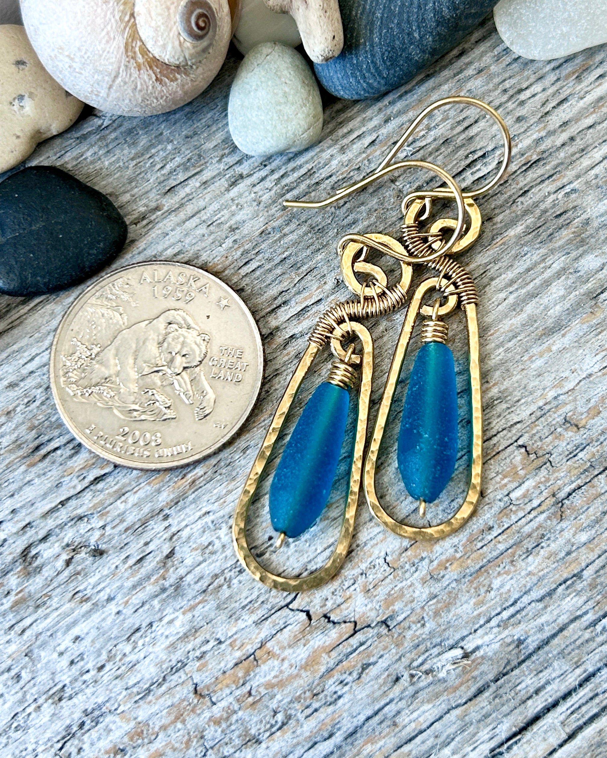 #1236 907 lmm Brass teardrop with teal frosted glass bead