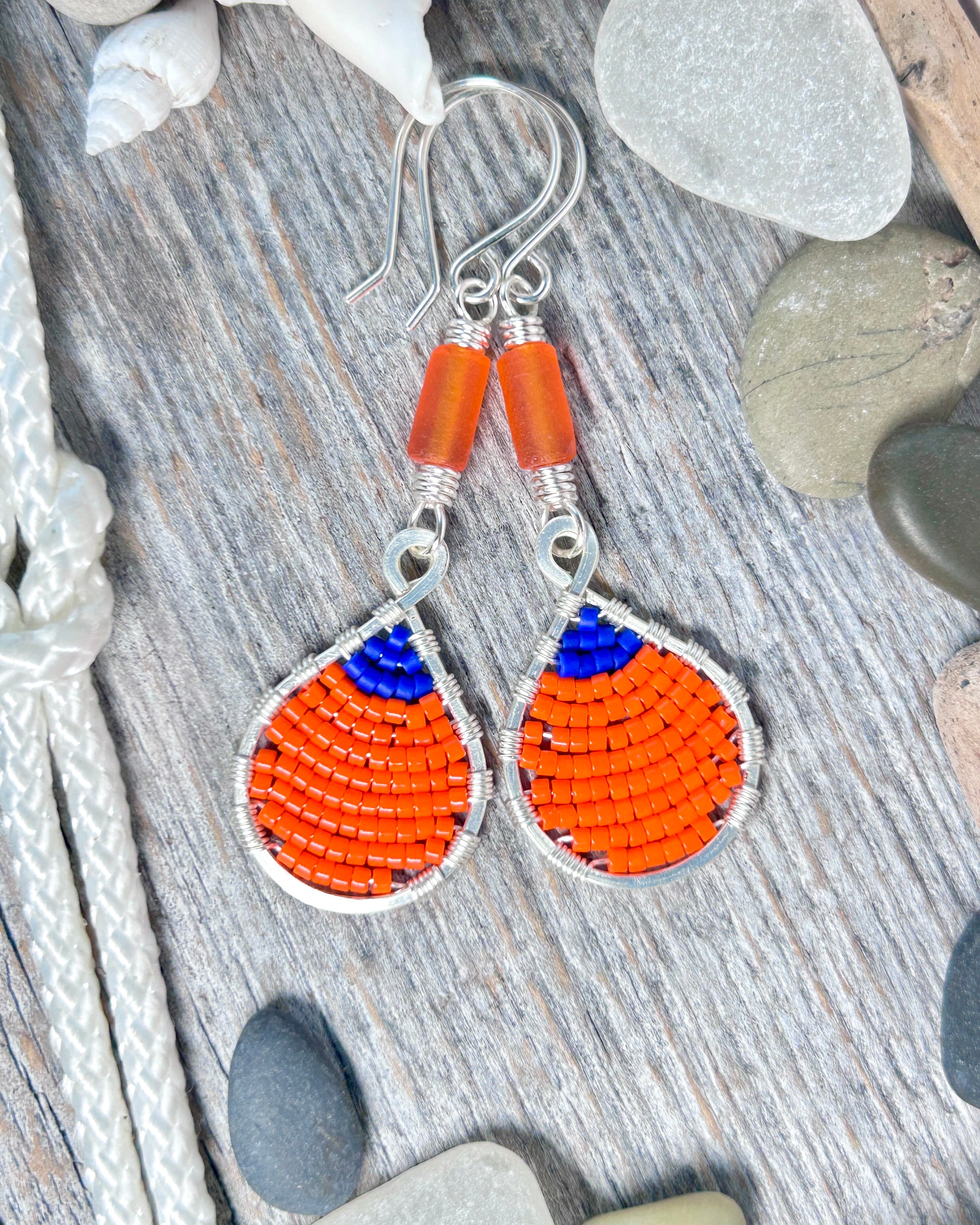 #1277 907 lmm Buoy Seed Bead, Small, Orange & Navy with Orange Tube Beads