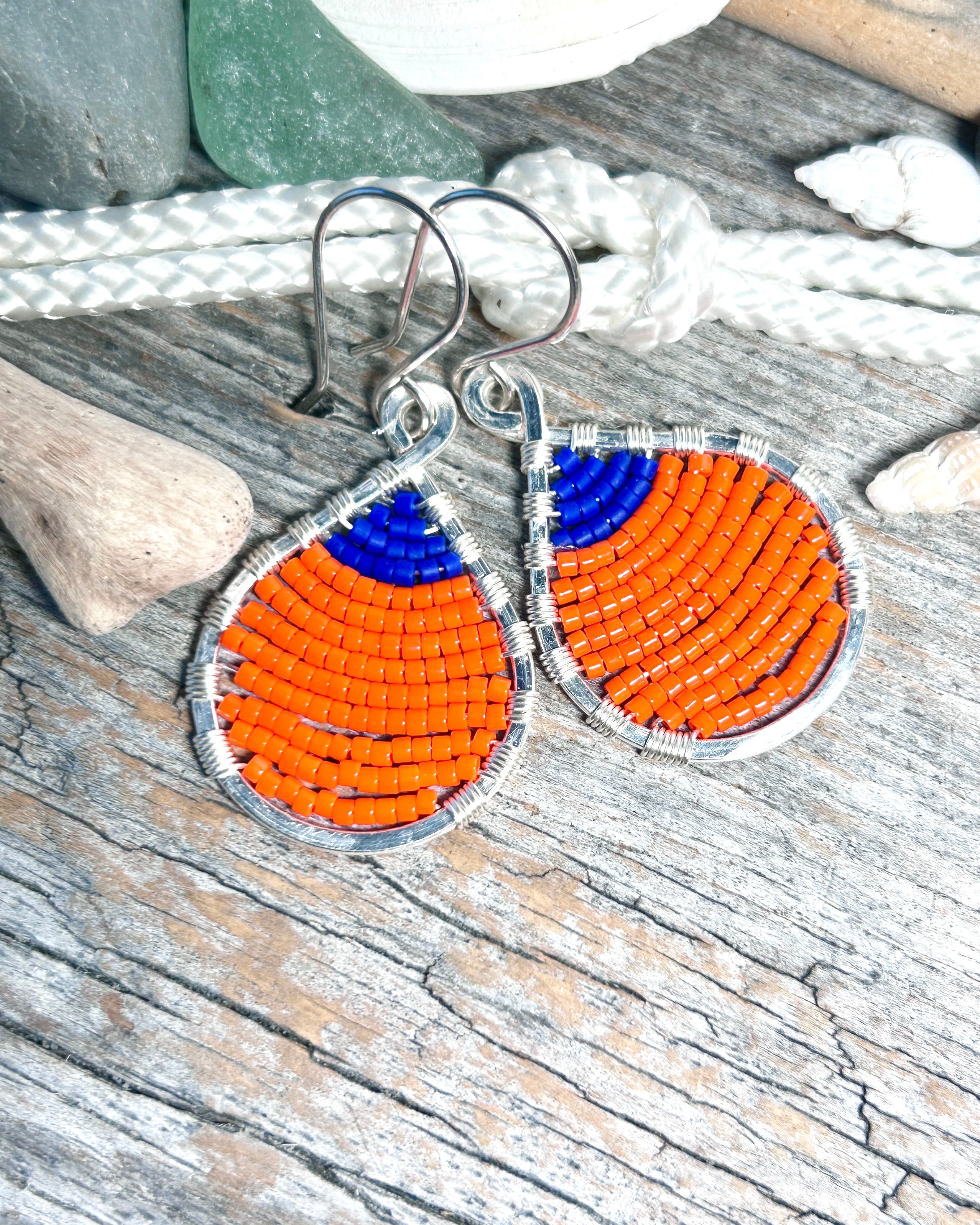 #1281 907 lmm Buoy Seed Bead, Large, Orange & Navy