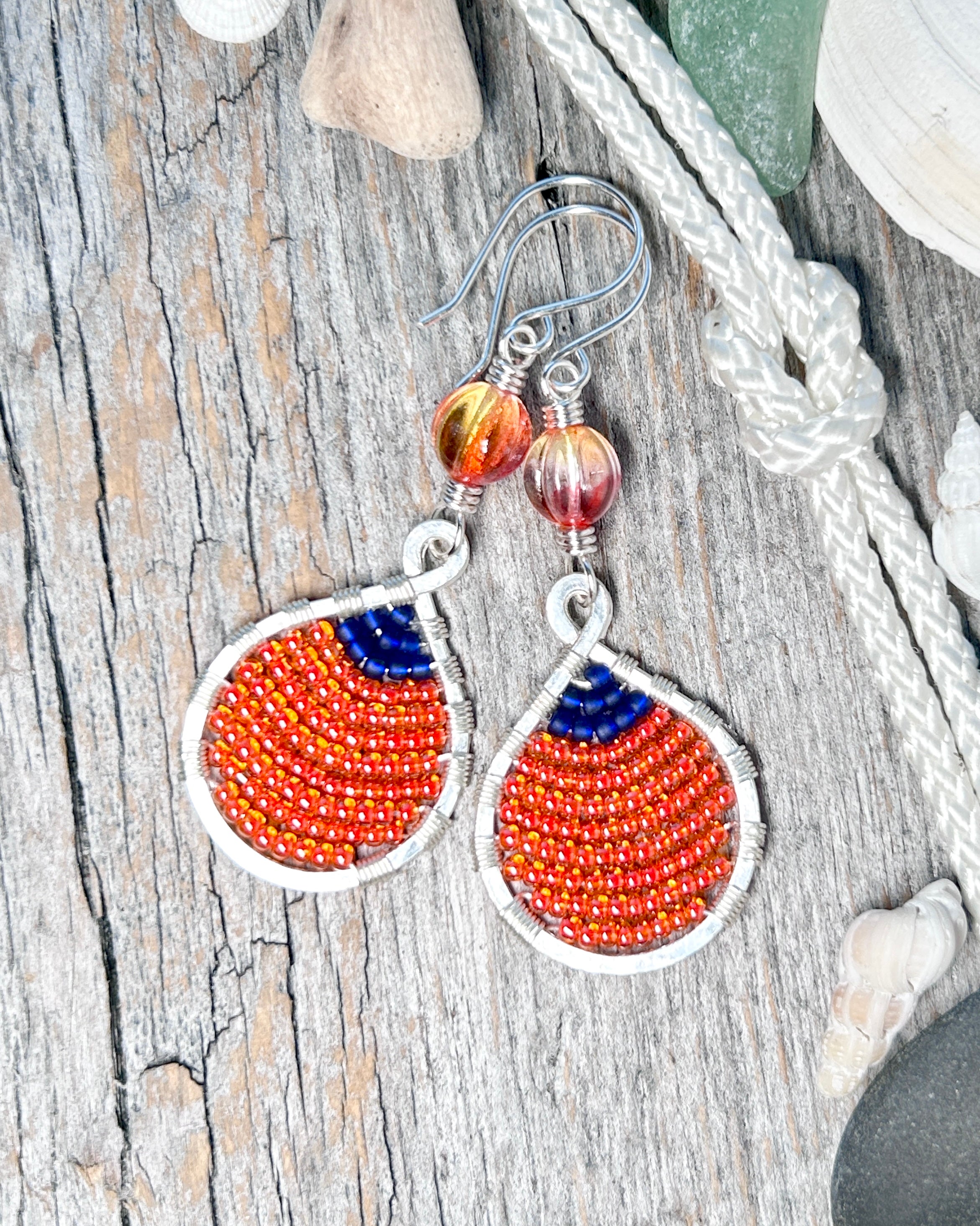 #1290 907 lmm Buoy Seed Bead, Large, Orange & Navy with Peachy Orange Melon Beads