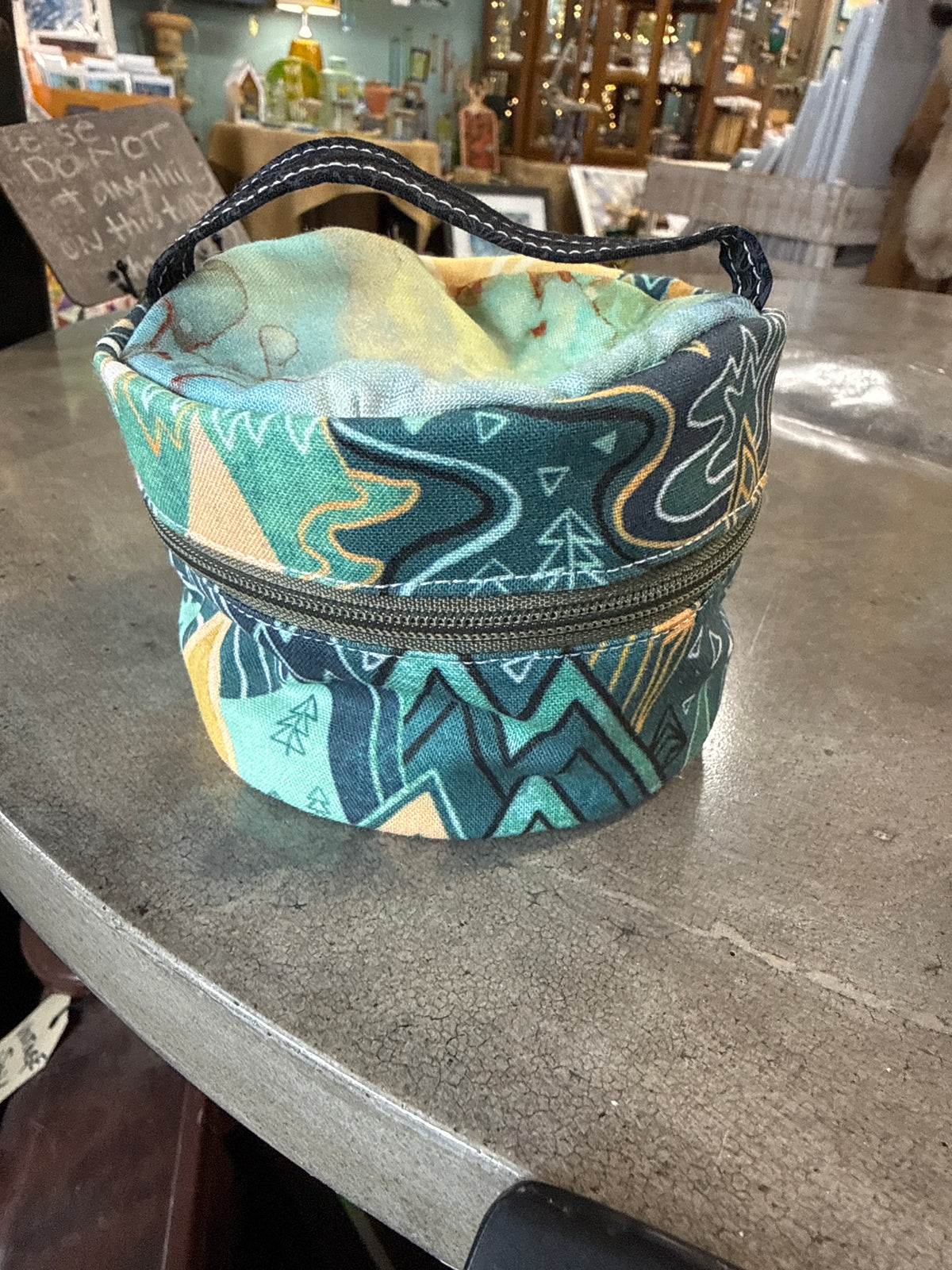 Small round zip pouch