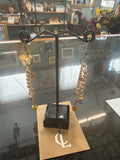 Earrings: Opalescent and glass beads with Clear Yellow flower feature. Brass chain. E20