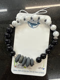 #345 Bracelet: Ninilchik Stones, Onyx, Hematite, Howlite, 7”