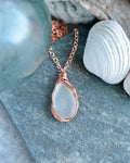 #200 necklace - Ninilchik sea glass clear, copper wire wrapped. 20”