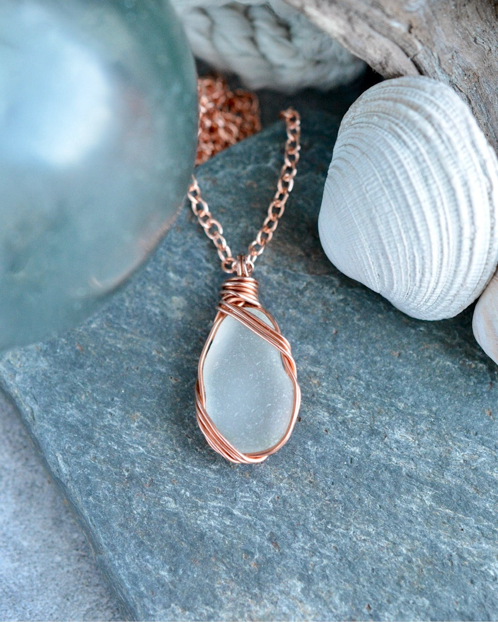 #200 necklace - Ninilchik sea glass clear, copper wire wrapped. 20”