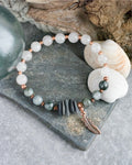 #247 bracelet - Ninilchik Stones w/ Eagle Eye Agate, White Quartz, copper feather