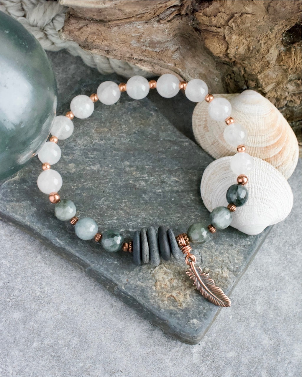#247 bracelet - Ninilchik Stones w/ Eagle Eye Agate, White Quartz, copper feather