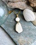 #277 Necklace - Ninilchik stone w/ Shiva shell on Brass bail, 20”
