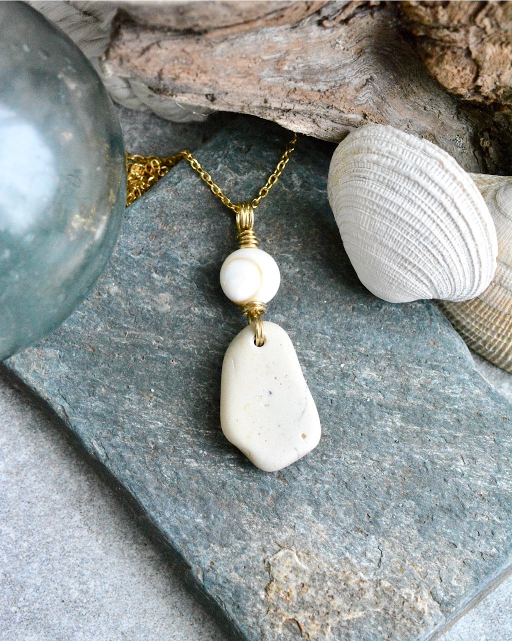 #277 Necklace - Ninilchik stone w/ Shiva shell on Brass bail, 20”